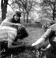 Jane Ostler, Fiona Thompson & ?, seem to be doing a spot of gardening.