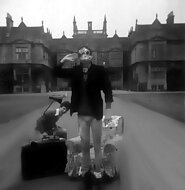 Roger & Hugh (in frog mask) in the driveway of Corsham court with a few props taken to the location.