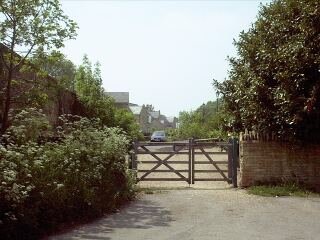 A closed gate - 'Private Land'.